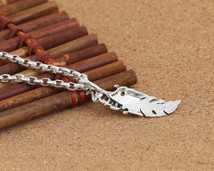 Retro Korean Type Skull Small Feather Pendant