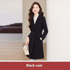 Black Suit Trench Coat Coat For Women Autumn worn by a woman standing indoors.
