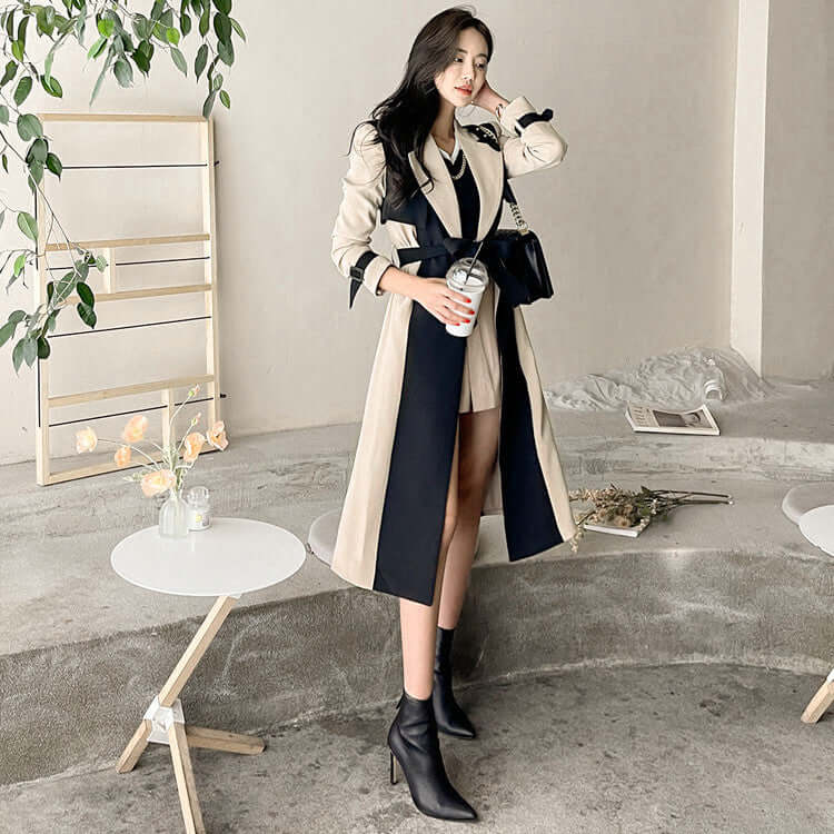 Fashionable Autumn Women's Long Trench Coat in khaki with stylish design and elegant silhouette.