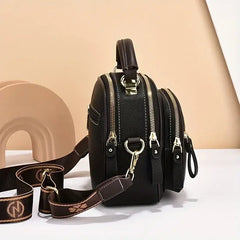 luxury shoulder bag for women with multiple zippers and adjustable strap, stylish and versatile design.