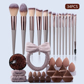 34PCS makeup tools, including a makeup brush set, a beauty egg,a powder puff set,a hair tie and wrist strap,and a cleansing puff