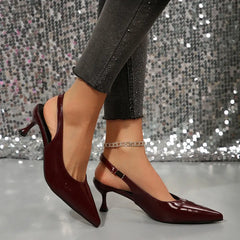 Elegant women heeled shoes in burgundy color with buckle strap, pointed toe, and thin heels, perfect for spring and autumn.