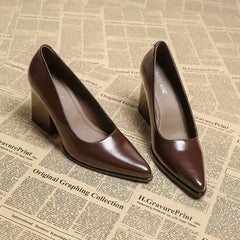 2026 New Spring Women Commuter Pumps Shoes with pointed toe and thick heel on newspaper background.