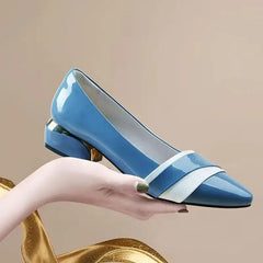 Elegant low heel office pumps for women in blue with square heels and stylish design.