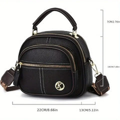 Luxury shoulder bag for women features a stylish black design with multiple compartments and a detachable strap.