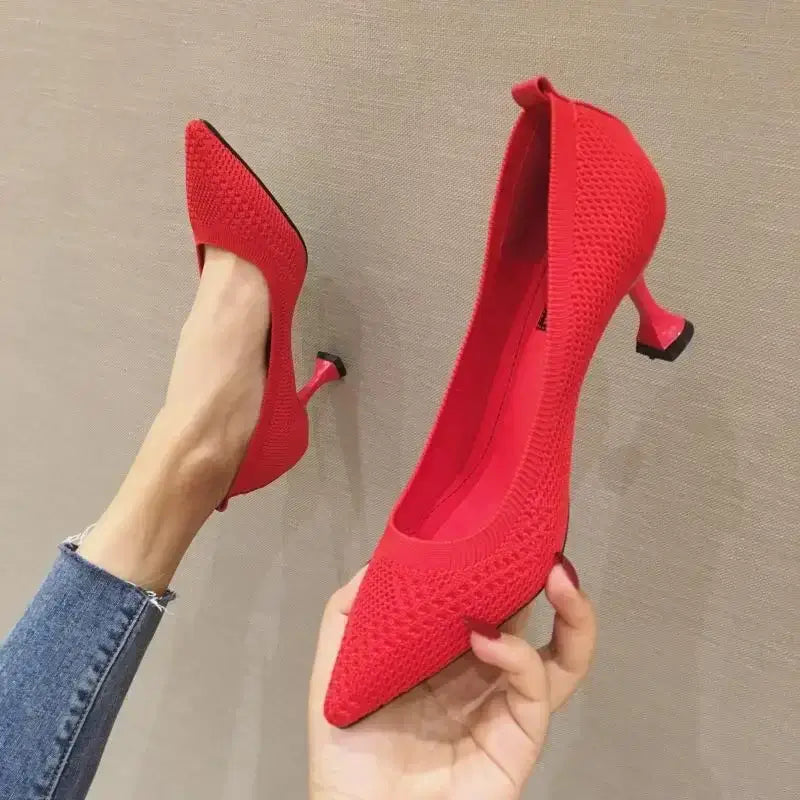 Women pumps summer high heel pumps for women in red color with pointed toe design and thin heels.