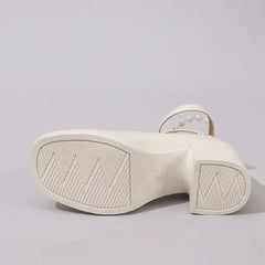 Elegant cross strap high heel pumps sole view showcasing the stylish design and comfort features.