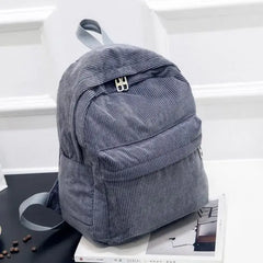 Fashionable zipper backpack for women, corduroy backpack, collegiate style versatile personalized backpack.