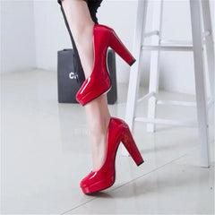 women's pointed toe high heel pumps in vibrant red with square heels, showcasing elegance for any occasion.