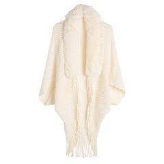 Women's Loose Tassel Fashion Shawl Jacket With Fur Collar in ivory color with batwing sleeves and fringe details.