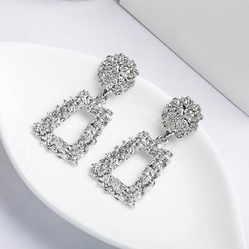 Metal earrings embossed floral earrings
