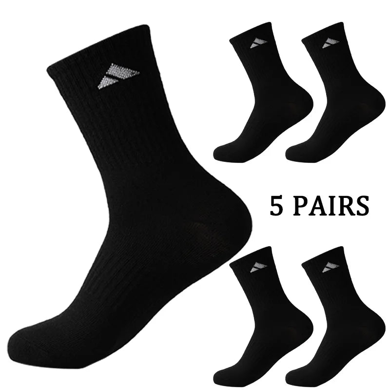 5 pairs of black and white patterned mid length socks suitable for both men and women comfortable and unisex sports socks