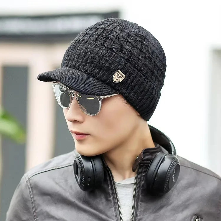 Men's Skullies Beanies with Visor for Warmth Winter Knit Earmuffs Thick Wool Lined Skull Ski Baseball Cap Winter Outdoor Riding