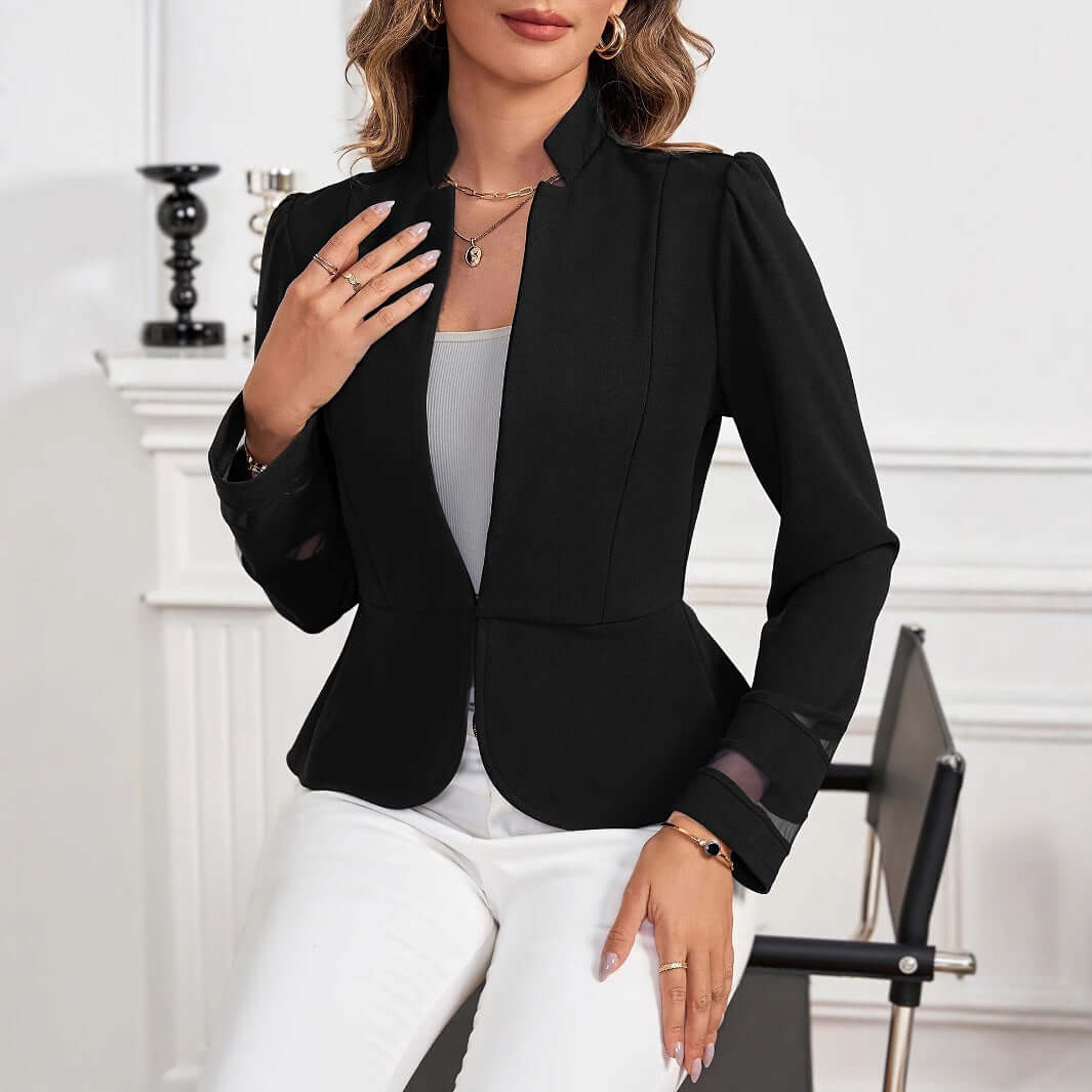 European And American Fashion Slim Suit Jacket in black worn by a woman, styled with white pants and urban accessories.