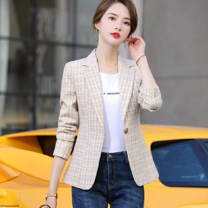 Korean Style British Casual Plaid Short Suit model wearing a light plaid blazer over a white shirt, standing by a yellow car.