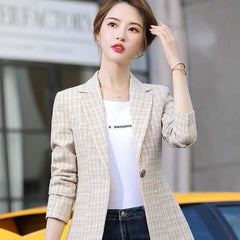 Korean Style British Casual Plaid Short Suit on a model, showcasing a sophisticated and trendy look in a casual setting.