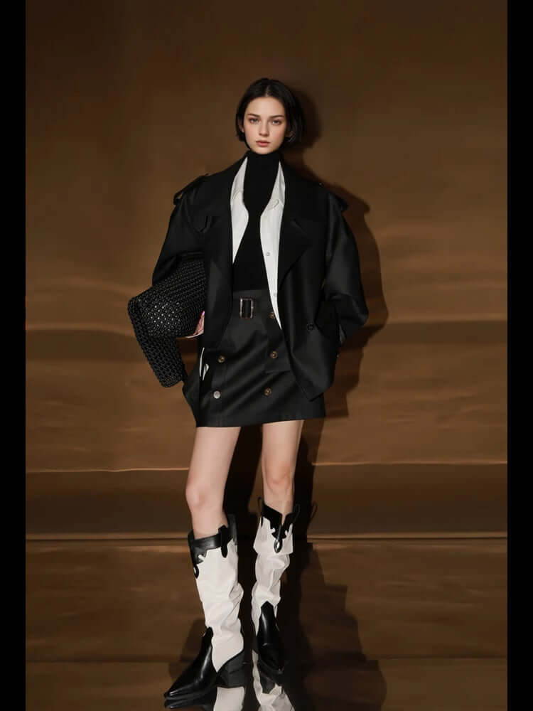 Loose Wide Retro British Trench Coat worn by model, featuring black and white color scheme with stylish boots.